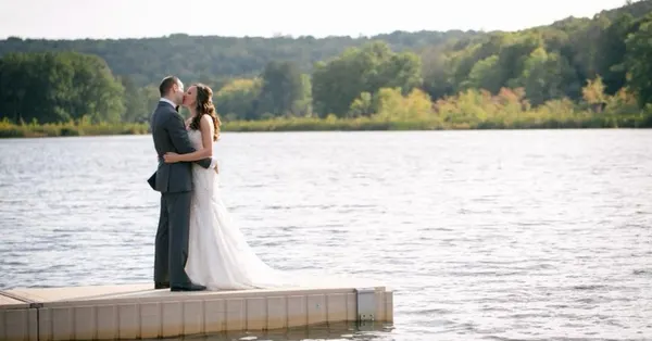 Couple kissing on the dock