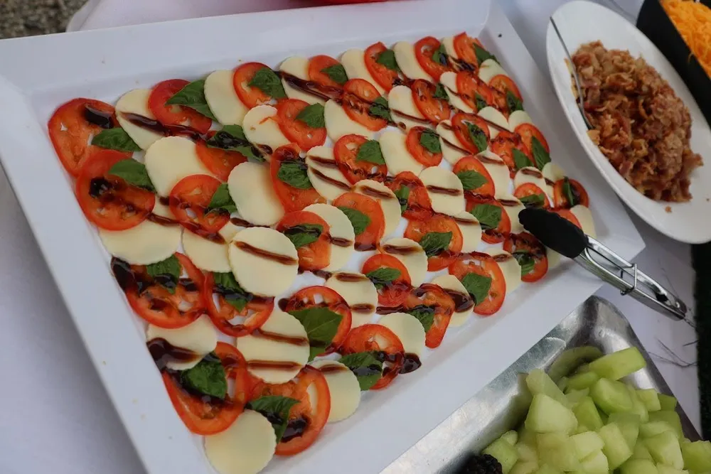 Caprese platter with fresh mozzarella, tomato and basil