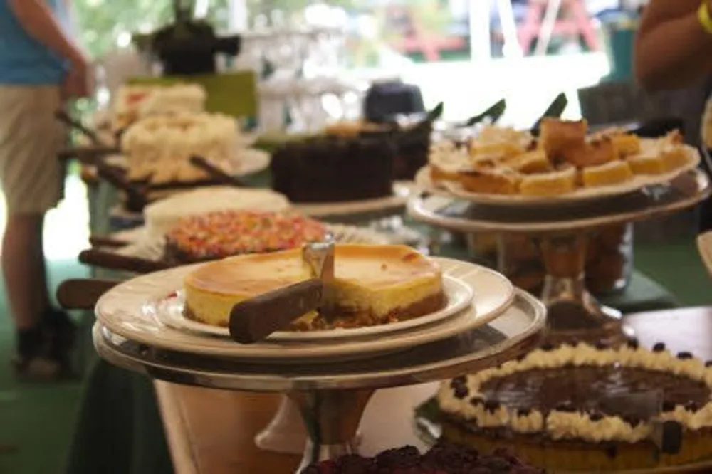 Dessert table with cakes and cheesecakes