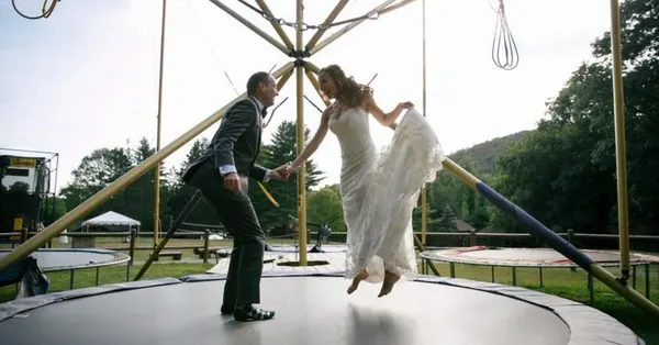 Guests bouncing on the bungee trampoline